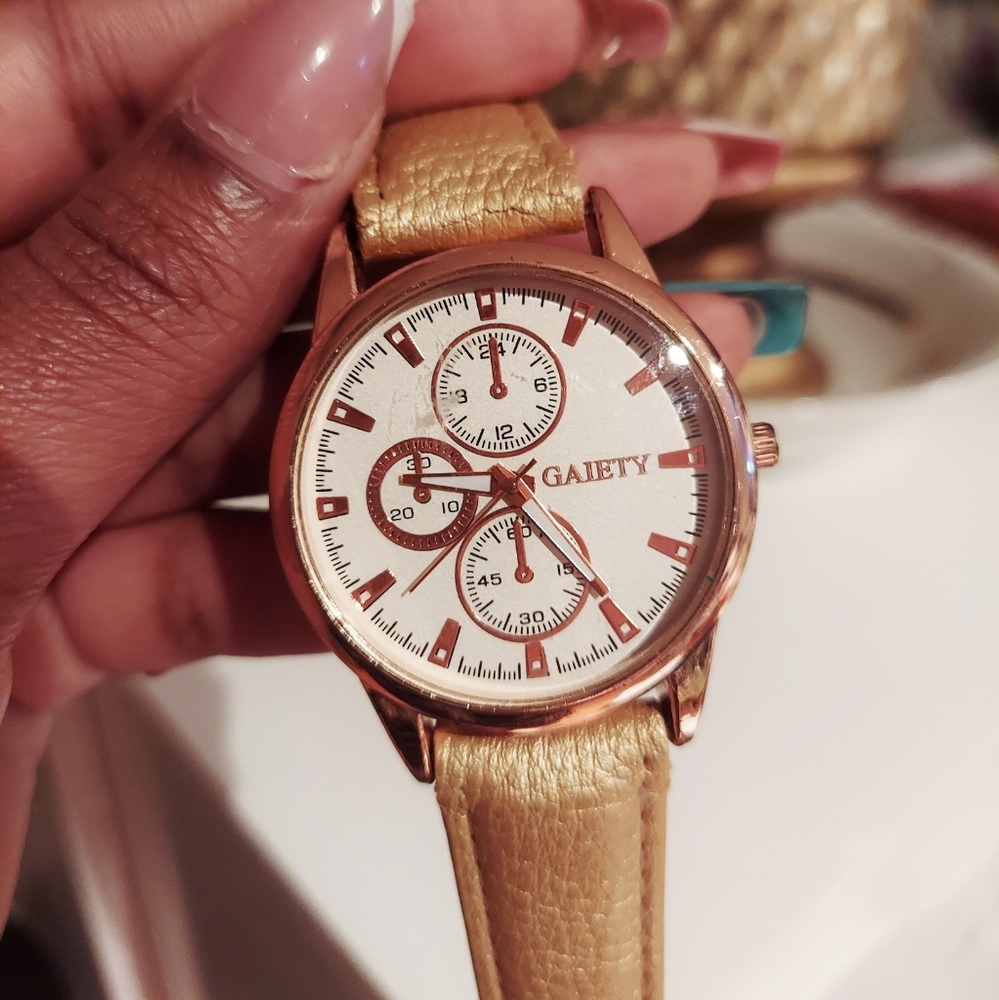 Gold faux leather watch with white face